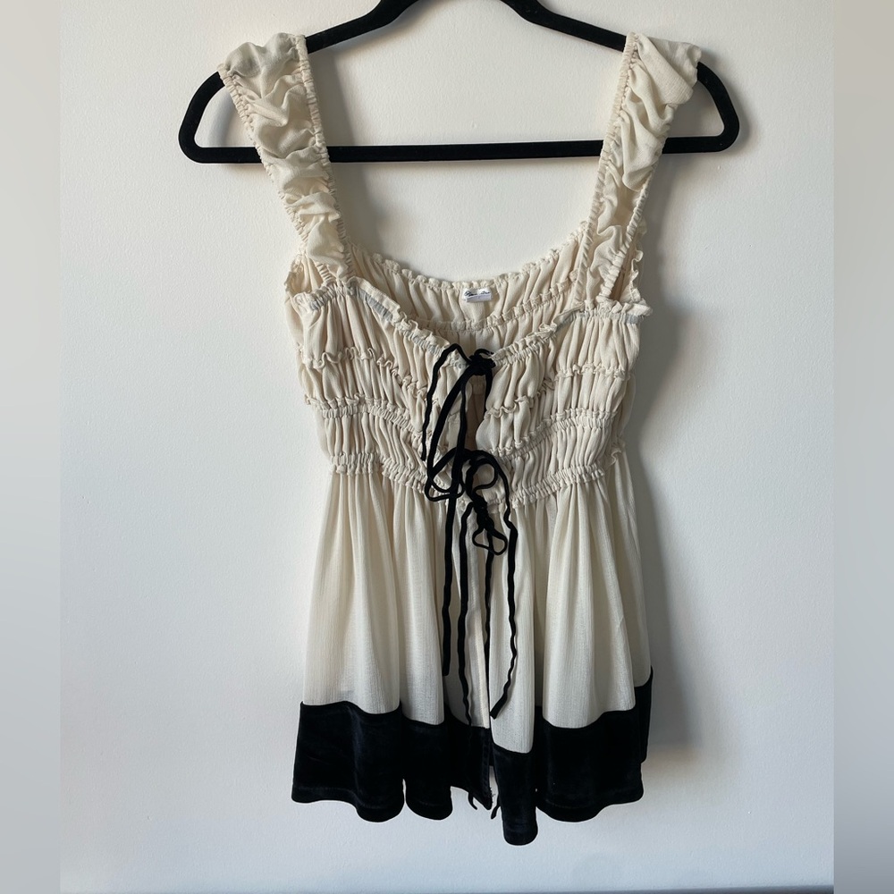 Ruched Cream and Black Sleeveless Blouse with Tie Front